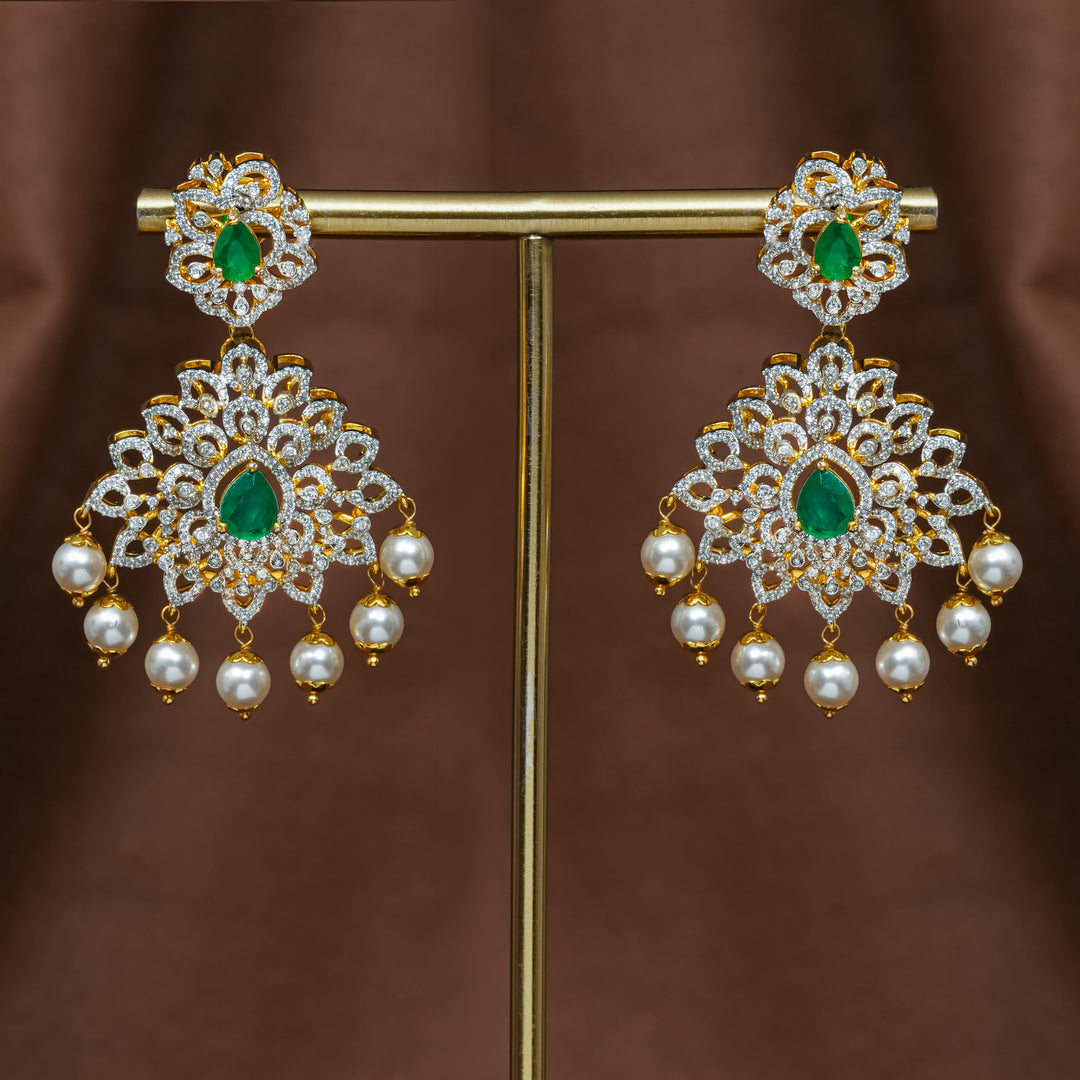 Full view of premium 92.5 silver cz emerald earrings with intricate detailing and pearl drops by Sri Fine Jewellery, Hyderabad (https://srifinejewellery.com)