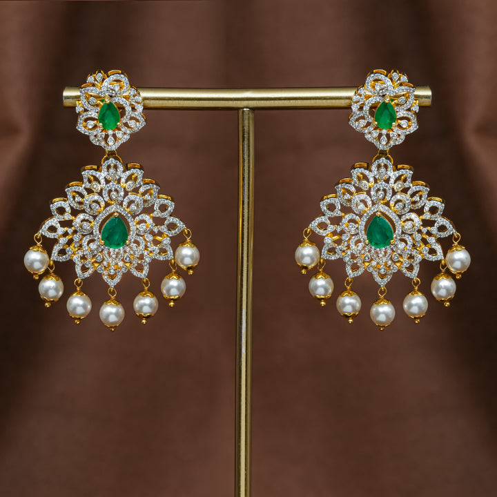 Full view of premium 92.5 silver cz emerald earrings with intricate detailing and pearl drops by Sri Fine Jewellery, Hyderabad (https://srifinejewellery.com)