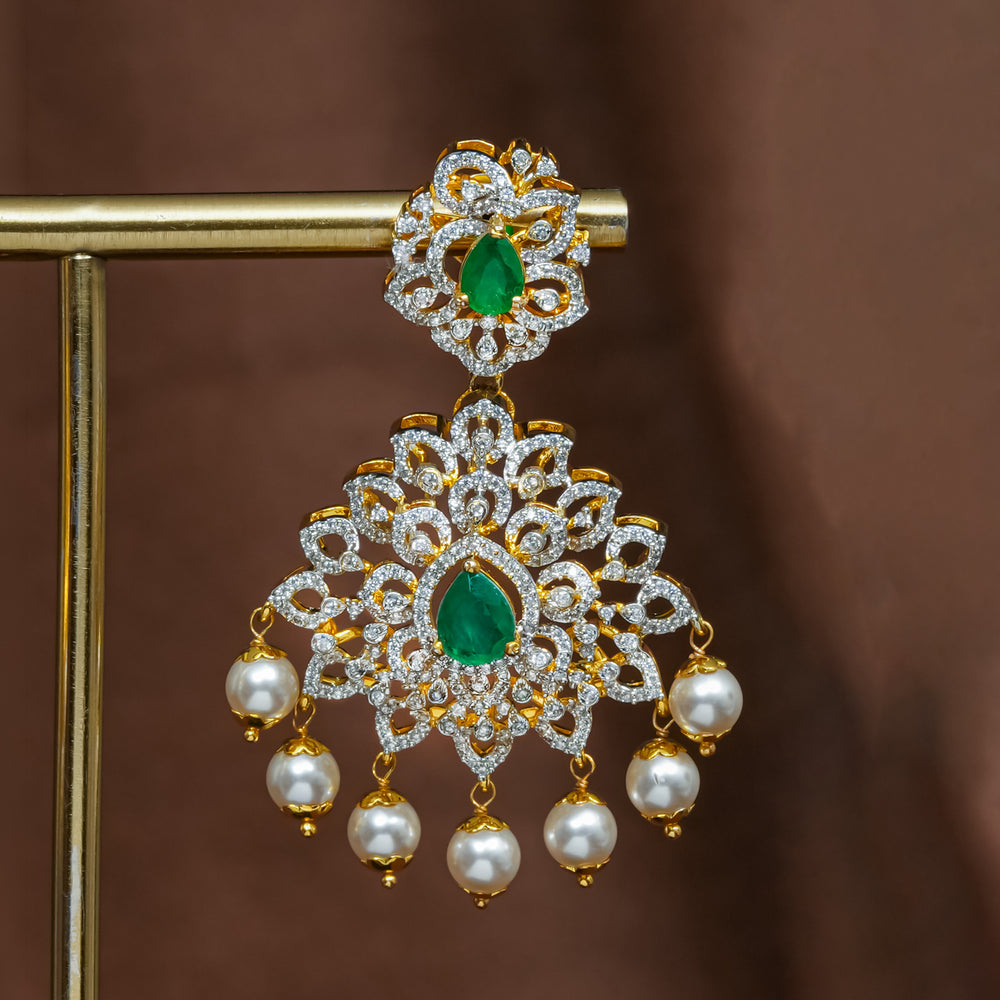 Close-upview of premium 92.5 silver cz emerald earrings with intricate detailing and pearl drops by Sri Fine Jewellery, Hyderabad (https://srifinejewellery.com)