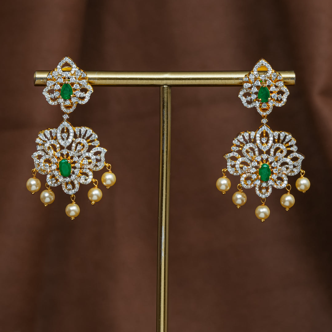 Full view of premium 92.5 silver cz emerald earrings with intricate detailing and pearl drops by Sri Fine Jewellery, Hyderabad (https://srifinejewellery.com)