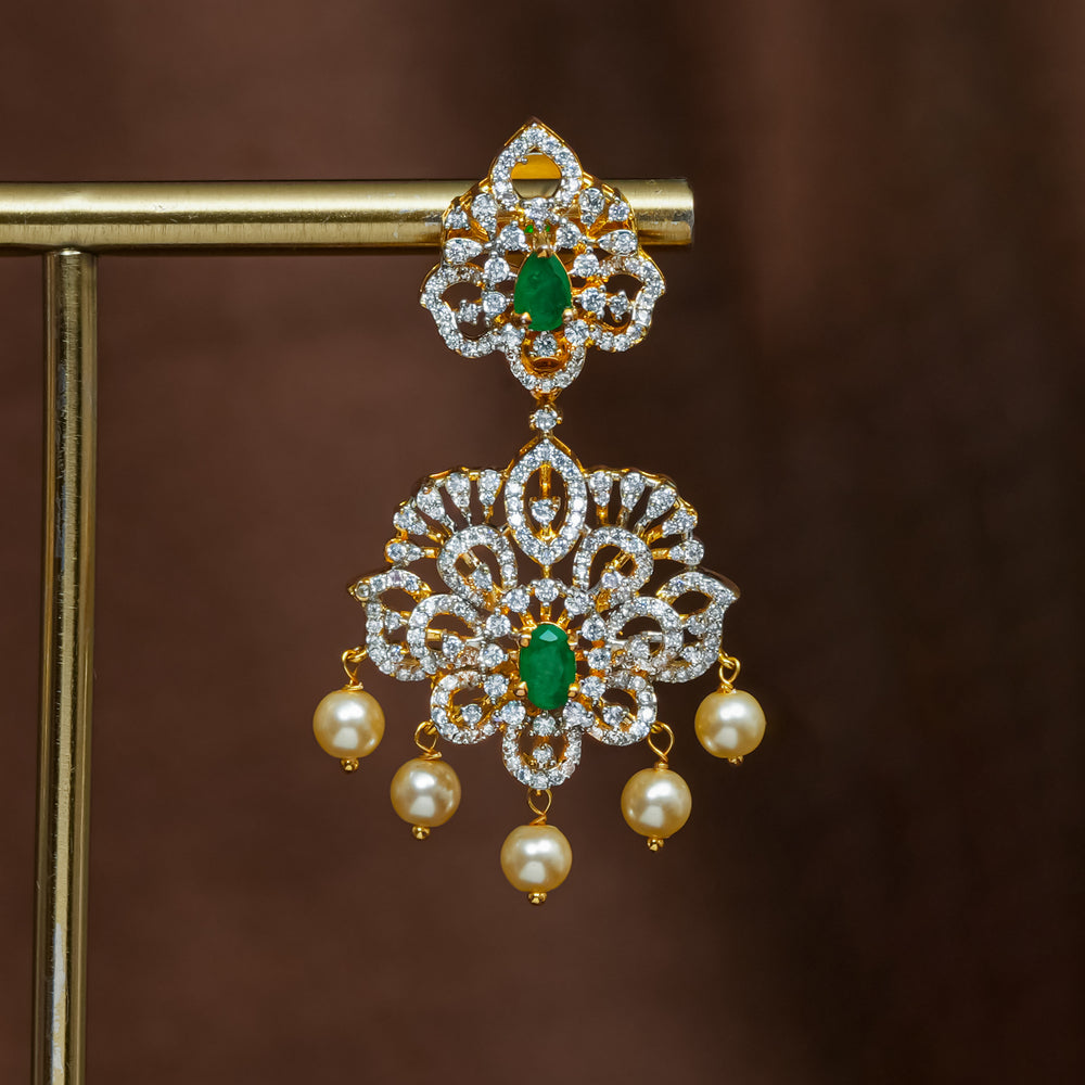 Close-up view of premium 92.5 silver cz emerald earrings with intricate detailing and pearl drops by Sri Fine Jewellery, Hyderabad (https://srifinejewellery.com)