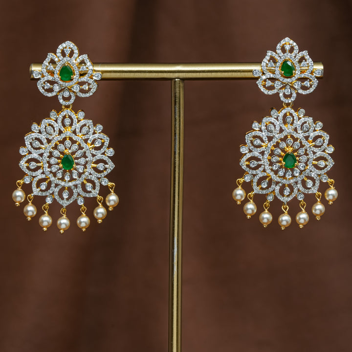 Full view of premium 92.5 silver cz emerald earrings with intricate detailing and pearl drops by Sri Fine Jewellery, Hyderabad (https://srifinejewellery.com)