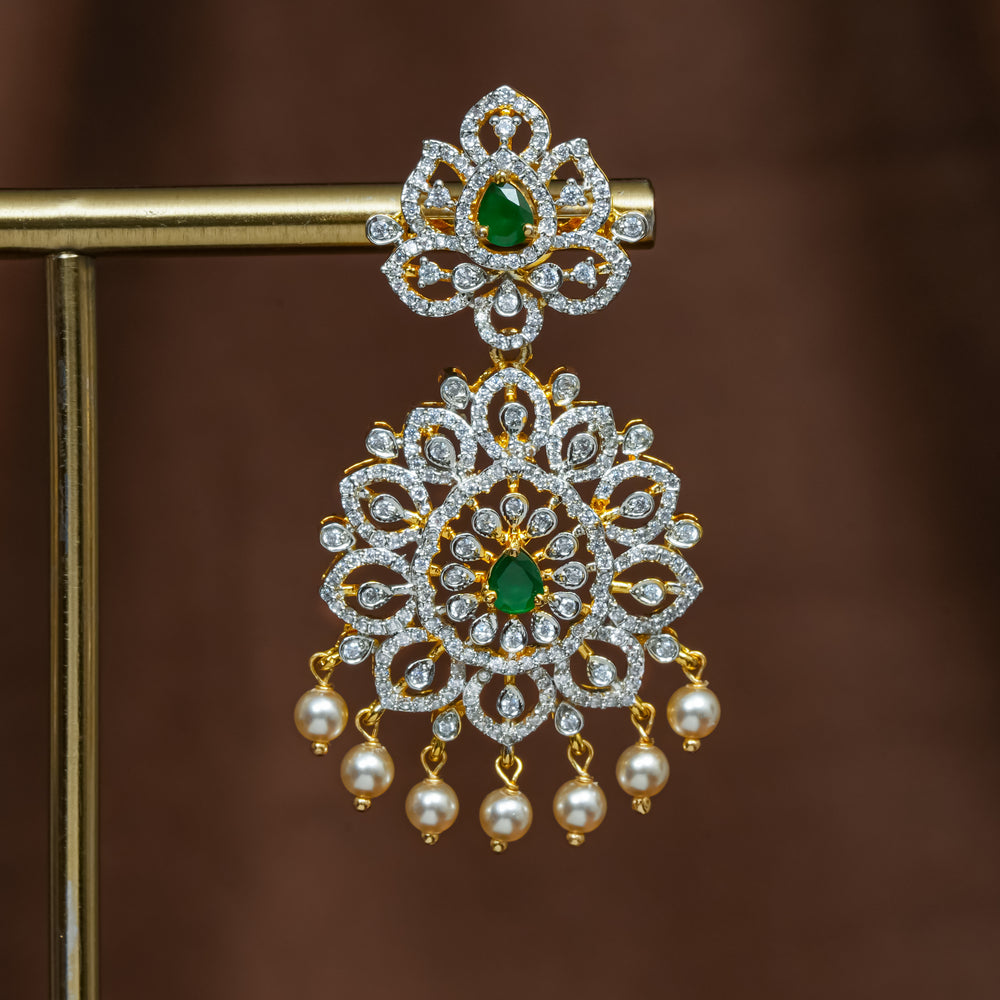 Close-up view of premium 92.5 silver cz emerald earrings with intricate detailing and pearl drops by Sri Fine Jewellery, Hyderabad (https://srifinejewellery.com)
