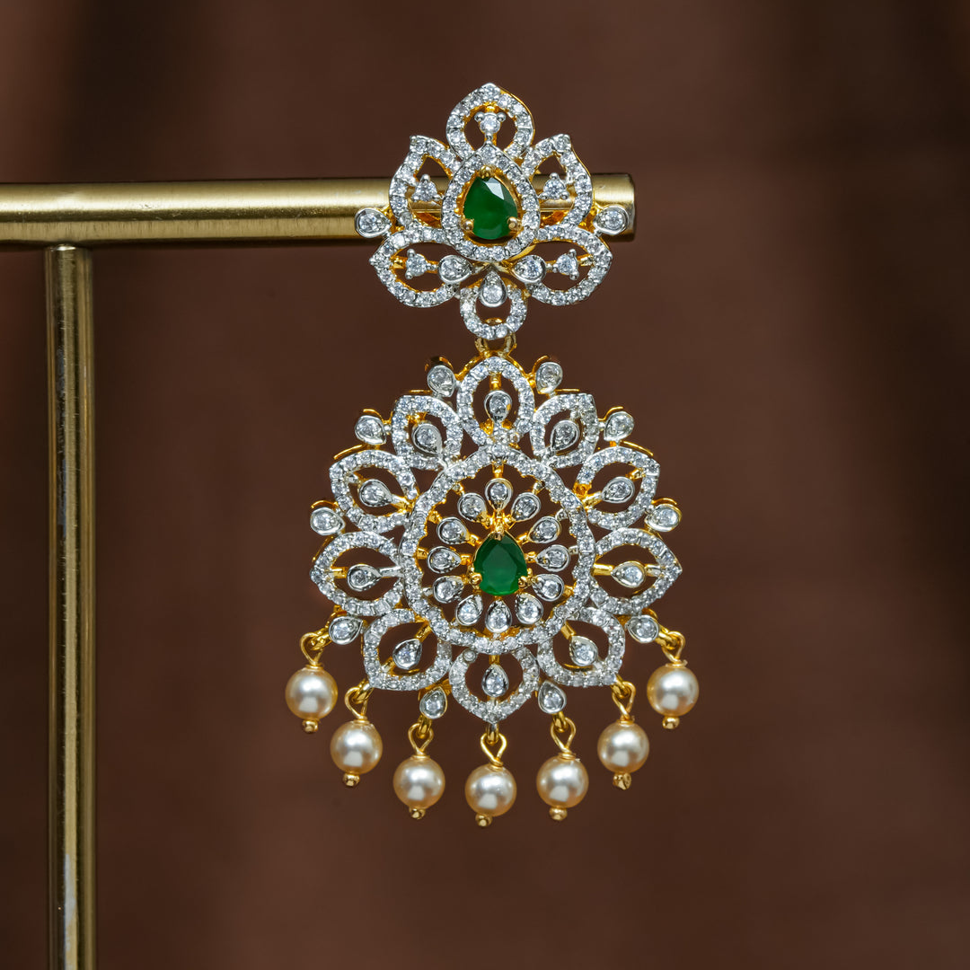 Close-up view of premium 92.5 silver cz emerald earrings with intricate detailing and pearl drops by Sri Fine Jewellery, Hyderabad (https://srifinejewellery.com)