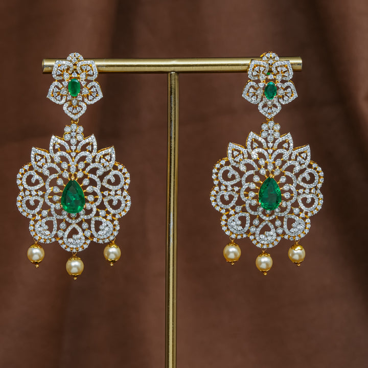 Full view of premium 92.5 silver cz emerald earrings with intricate detailing and pearl drops by Sri Fine Jewellery, Hyderabad (https://srifinejewellery.com)