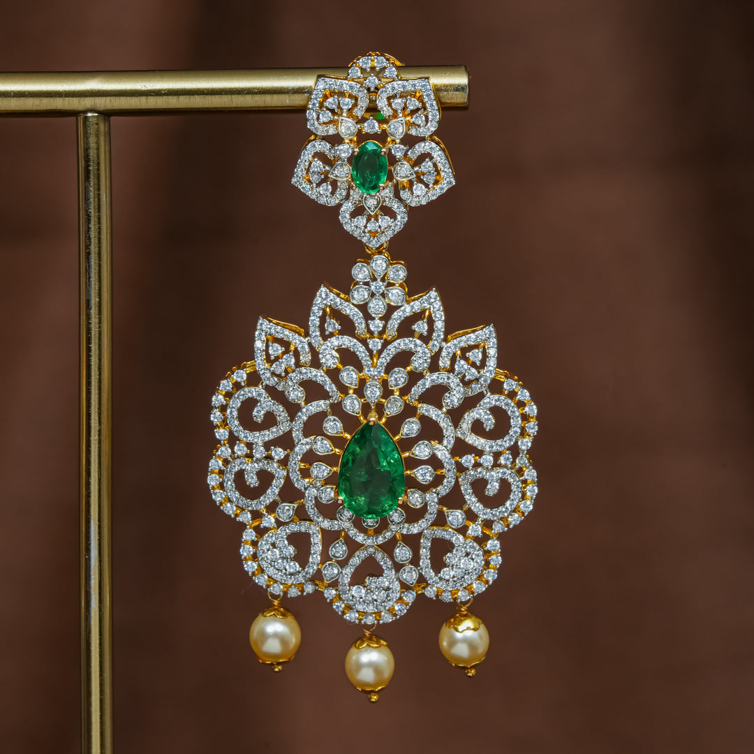 Close-up view of premium 92.5 silver cz emerald earrings with intricate detailing and pearl drops by Sri Fine Jewellery, Hyderabad (https://srifinejewellery.com)