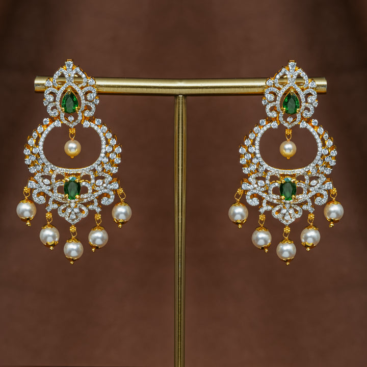 Full view of premium 92.5 silver cz emerald chandbali earrings with intricate detailing and pearl drops by Sri Fine Jewellery, Hyderabad (https://srifinejewellery.com)