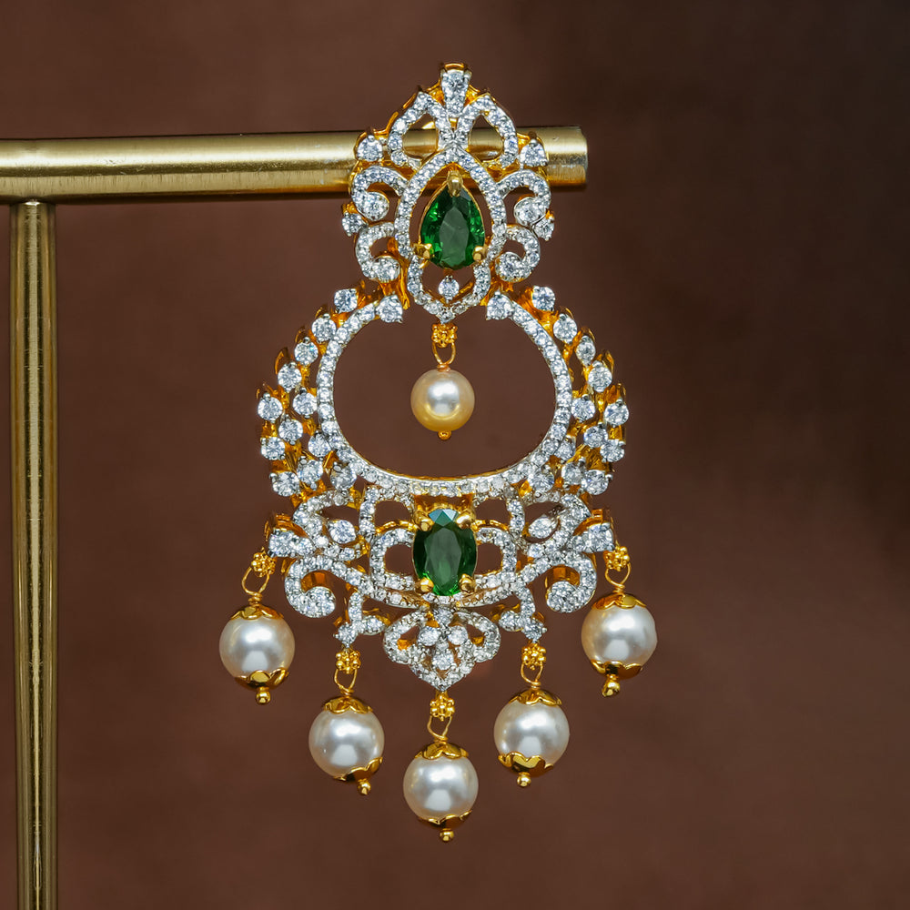 Close-up view of premium 92.5 silver cz emerald chandbali earrings with intricate detailing and pearl drops by Sri Fine Jewellery, Hyderabad (https://srifinejewellery.com)