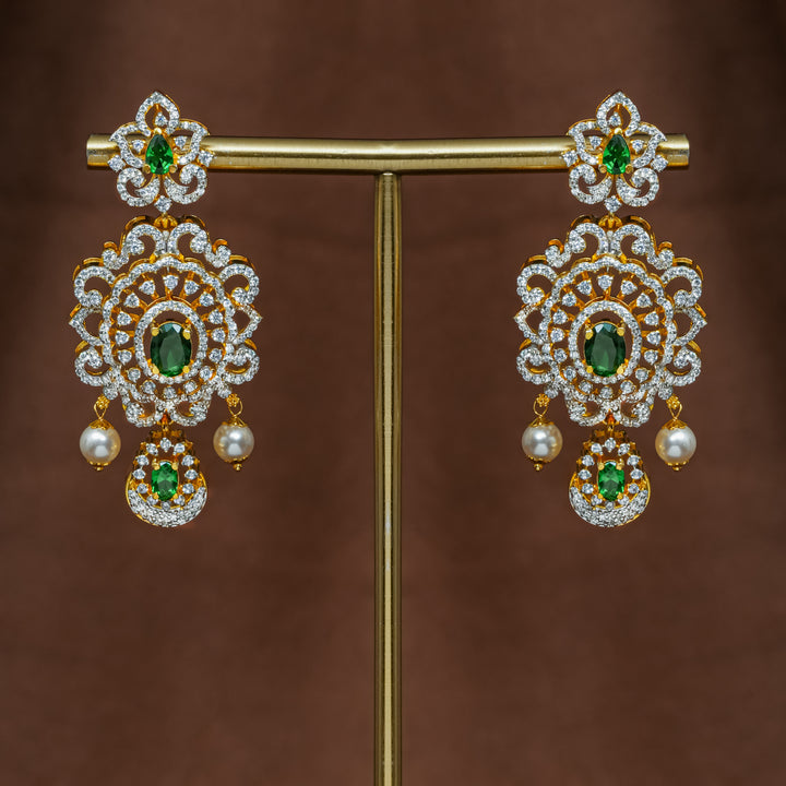 Full view of premium 92.5 silver cz emerald earrings with intricate detailing and pearl drops by Sri Fine Jewellery, Hyderabad (https://srifinejewellery.com)
