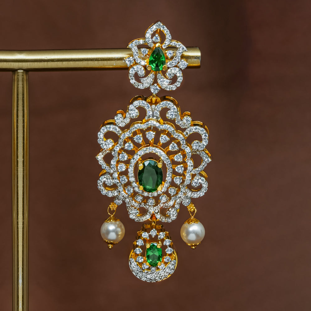 Close-up view of premium 92.5 silver cz emerald earrings with intricate detailing and pearl drops by Sri Fine Jewellery, Hyderabad (https://srifinejewellery.com)