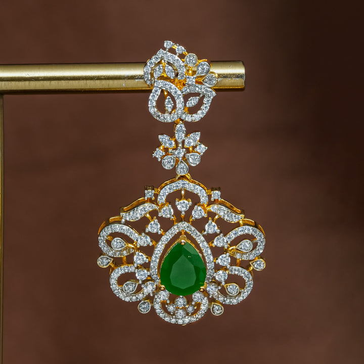 Close-up view of premium 92.5 silver cz emerald earrings with intricate detailing and pearl drops by Sri Fine Jewellery, Hyderabad (https://srifinejewellery.com)