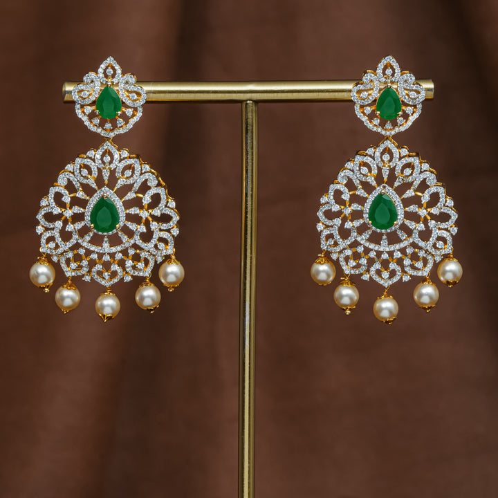 Full view of premium 92.5 silver cz emerald earrings with intricate detailing and pearl drops by Sri Fine Jewellery, Hyderabad (https://srifinejewellery.com)