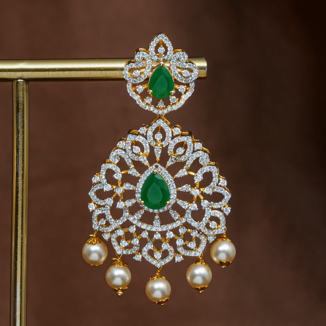 Close-up view of premium 92.5 silver cz emerald earrings with intricate detailing and pearl drops by Sri Fine Jewellery, Hyderabad (https://srifinejewellery.com)