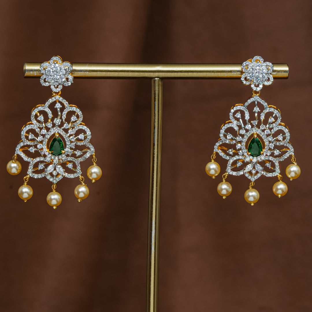 Full view of premium 92.5 silver cz emerald earrings with intricate detailing and pearl drops by Sri Fine Jewellery, Hyderabad (https://srifinejewellery.com)