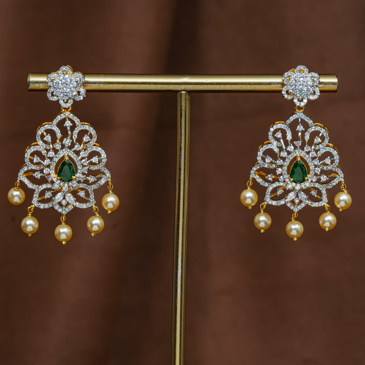 Full view of premium 92.5 silver cz emerald earrings with intricate detailing and pearl drops by Sri Fine Jewellery, Hyderabad (https://srifinejewellery.com)