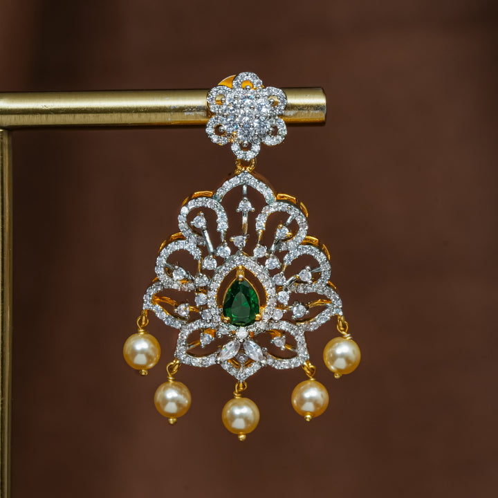 Close-up view of premium 92.5 silver cz emerald earrings with intricate detailing and pearl drops by Sri Fine Jewellery, Hyderabad (https://srifinejewellery.com)