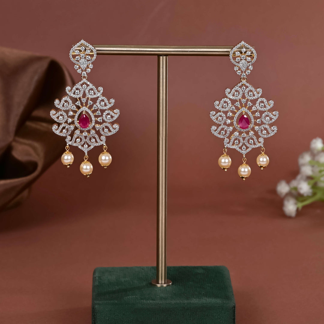 Hriday collection of 92.5 silver earrings with CZ stones, intricate  design for bridal and festive wear by Sri fine jewellery, Hyderabad.
(https://www.srifinejewellery.com)