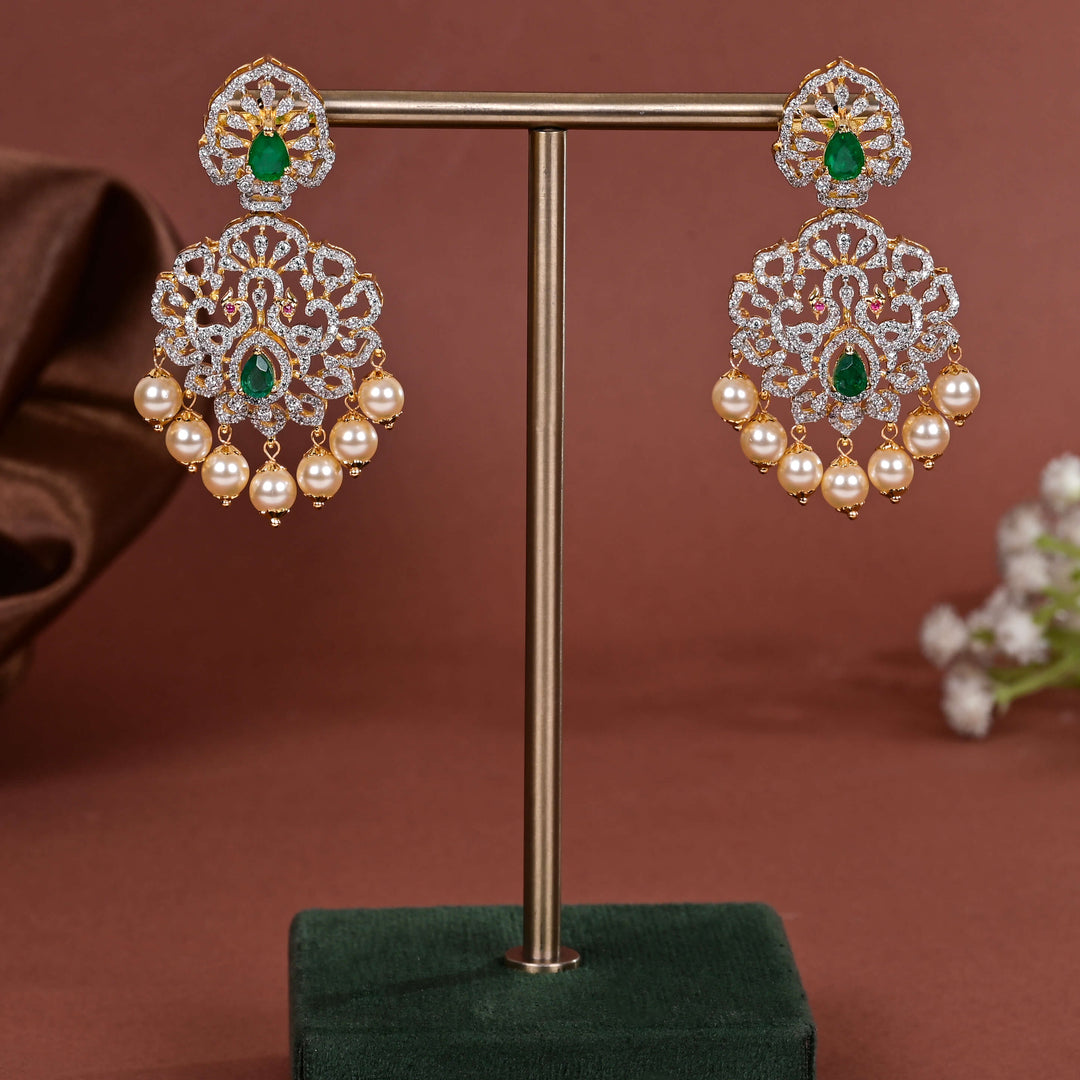 Hriday collection of 92.5 silver earrings with CZ stones, intricate  design for bridal and festive wear by Sri fine jewellery, Hyderabad.
(https://www.srifinejewellery.com)