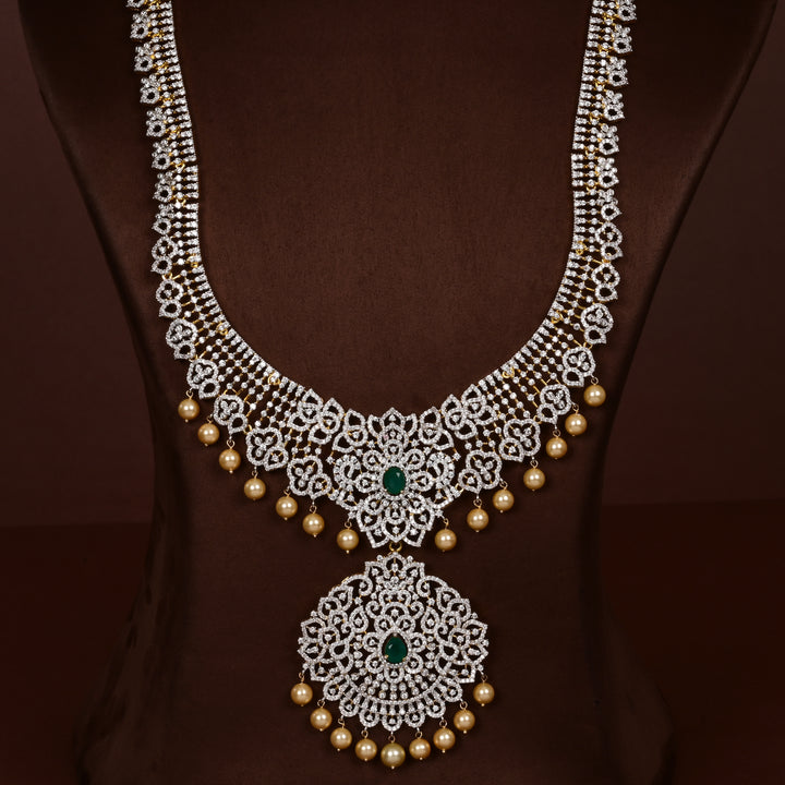 Luxury diamond-look silver cz emerald necklace with premium cz stones, semi-precious emerald stone and  pearl drops in 92.5 silver, bridal wedding jewellery with gold finish by Sri Fine Jewellery Punjagutta Hyderabad.