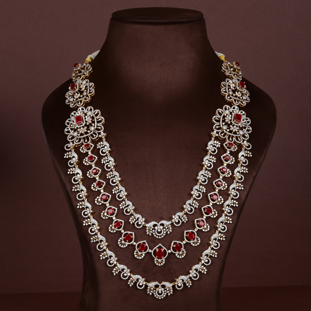 Hriday collection of  92.5 silver long necklace with CZ stones, intricate floral motifs, and pendant design for bridal and festive wear by Sri Fine Jewellery, Hyderabad