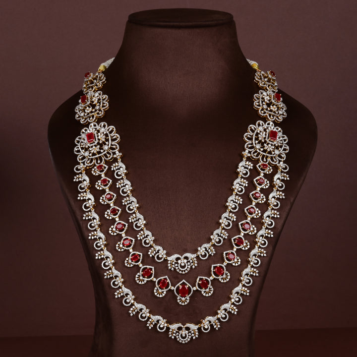 Hriday collection of  92.5 silver long necklace with CZ stones, intricate floral motifs, and pendant design for bridal and festive wear by Sri Fine Jewellery, Hyderabad