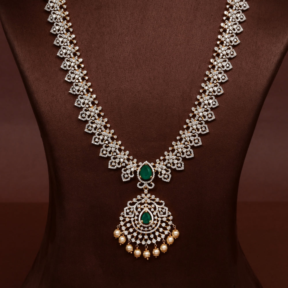 Close-up of Hriday collection of  92.5 silver Victorian-style long necklace with CZ stones, intricate floral motifs, and pendant design for bridal and festive wear by Sri Fine Jewellery, Hyderabad.