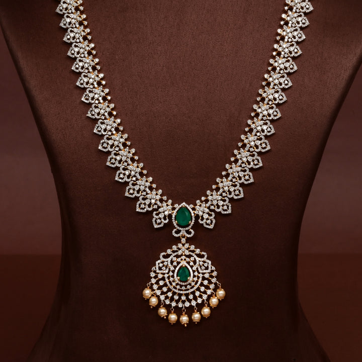 Close-up of Hriday collection of  92.5 silver Victorian-style long necklace with CZ stones, intricate floral motifs, and pendant design for bridal and festive wear by Sri Fine Jewellery, Hyderabad.