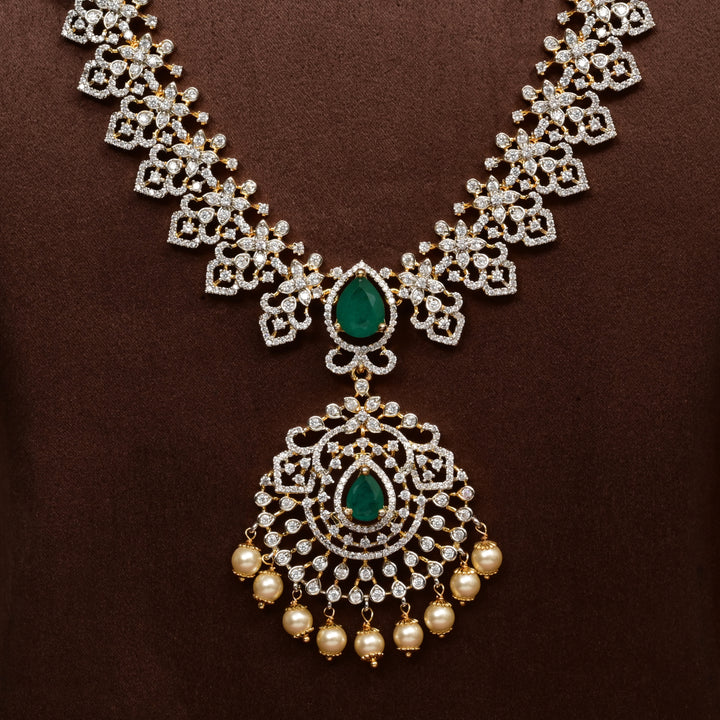 Close-up of Hriday collection of  92.5 silver Victorian-style long necklace with CZ stones, intricate floral motifs, and pendant design for bridal and festive wear by Sri Fine Jewellery, Hyderabad.