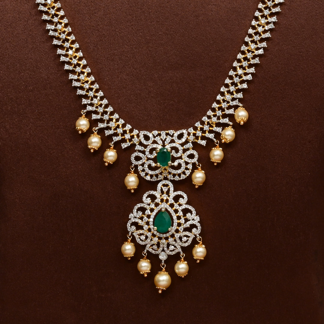 Close-up of Hriday collection of  92.5 silver Victorian-style long necklace with CZ stones, intricate floral motifs, and pendant design for bridal and festive wear by Sri Fine Jewellery, Hyderabad.