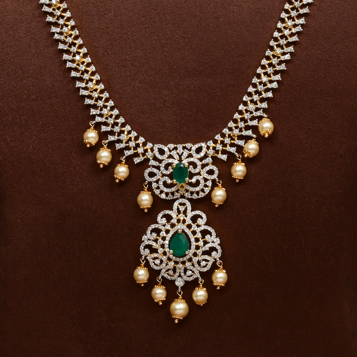 Close-up of Hriday collection of  92.5 silver Victorian-style long necklace with CZ stones, intricate floral motifs, and pendant design for bridal and festive wear by Sri Fine Jewellery, Hyderabad.