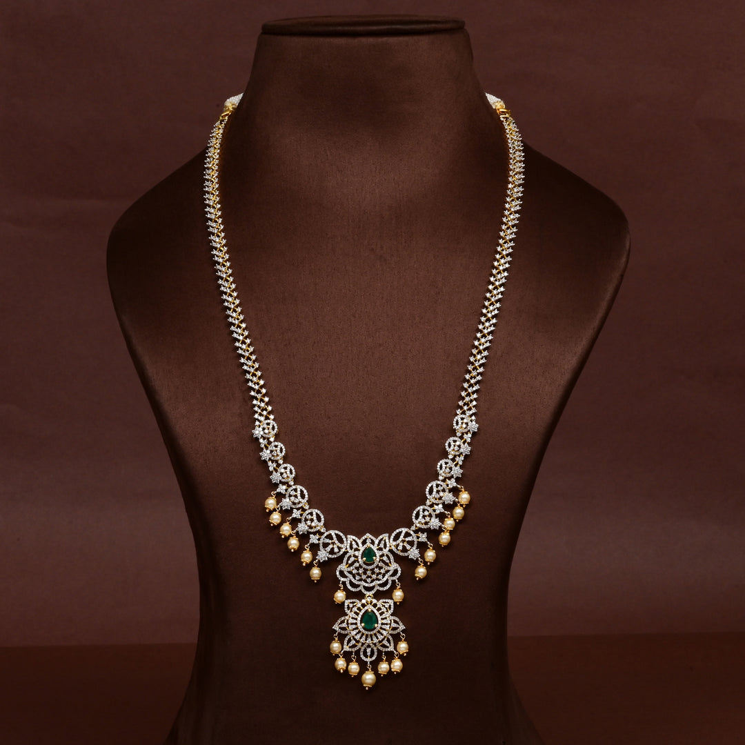 Hriday collection of 92.5 silver long necklace with CZ stones, intricate floral motifs, and pendant design for bridal and festive wear by Sri Fine Jewellery, Hyderabad.