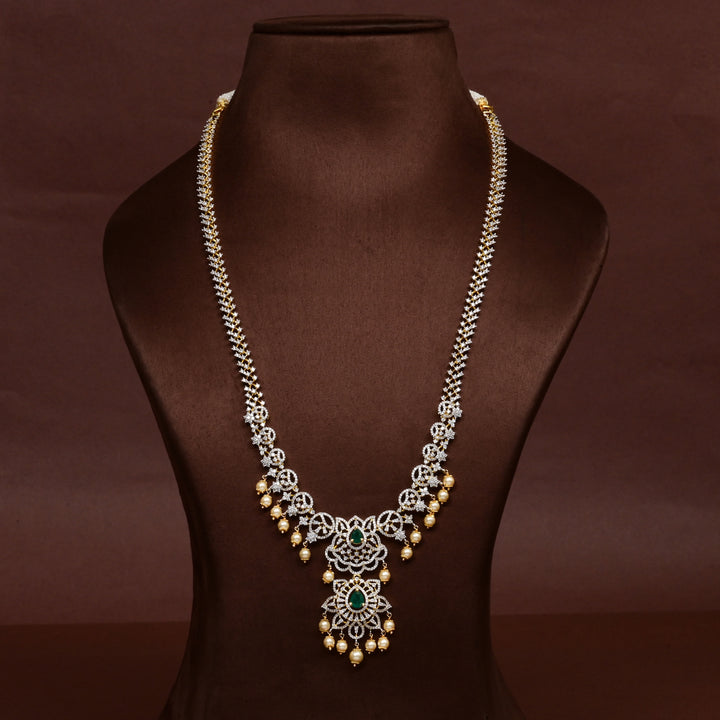 Hriday collection of 92.5 silver long necklace with CZ stones, intricate floral motifs, and pendant design for bridal and festive wear by Sri Fine Jewellery, Hyderabad.