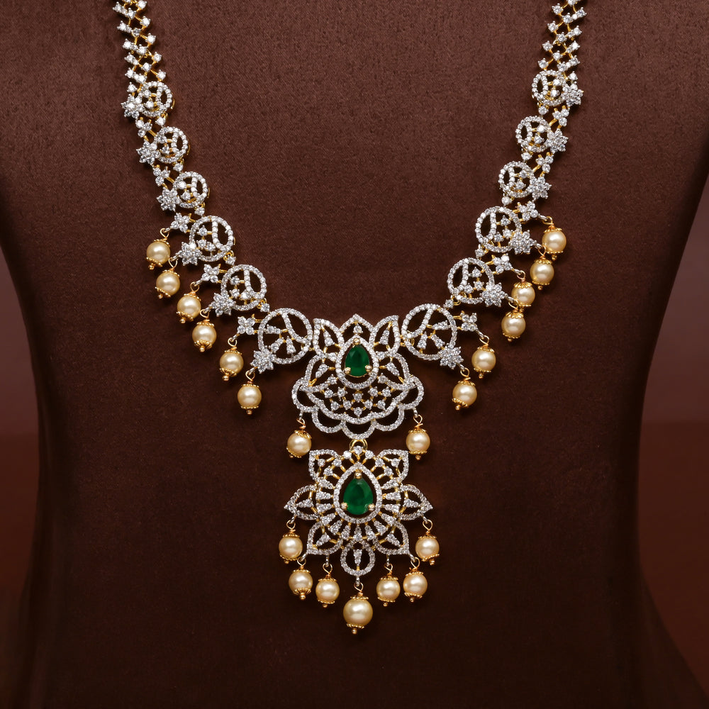 Close-up of Hriday collection of 92.5 silver long necklace with CZ stones, intricate floral motifs, and pendant design for bridal and festive wear by Sri Fine Jewellery, Hyderabad.