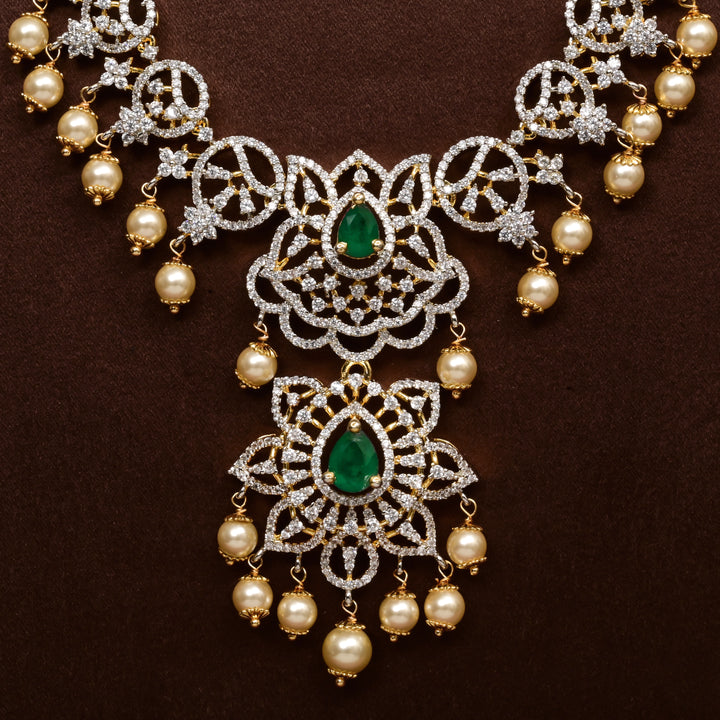 Close-up of Hriday collection of 92.5 silver long necklace with CZ stones, intricate floral motifs, and pendant design for bridal and festive wear by Sri Fine Jewellery, Hyderabad.