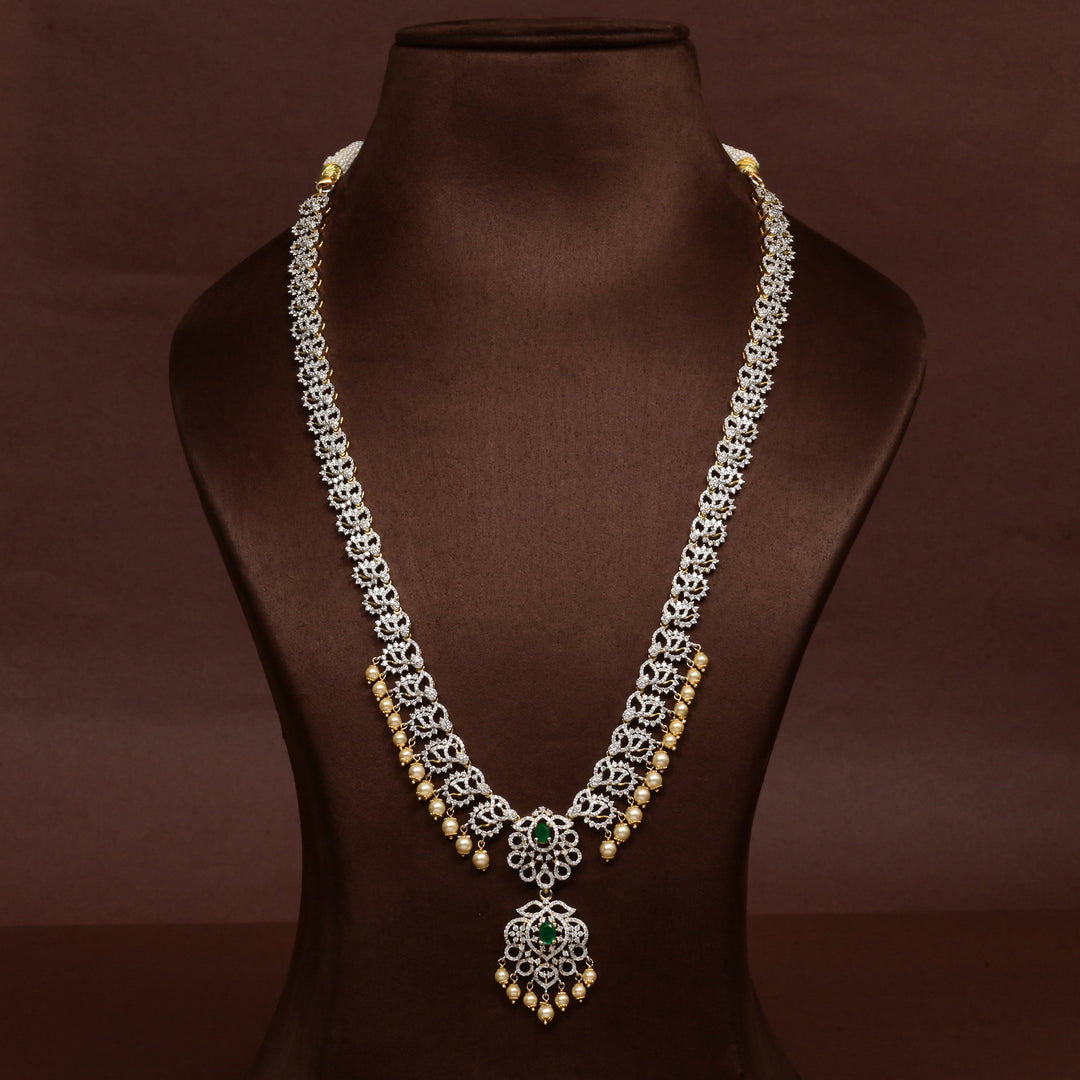 Hriday collection of 92.5 silver long necklace with CZ stones, intricate floral motifs, and pendant design for bridal and festive wear by Sri Fine Jewellery, Hyderabad.