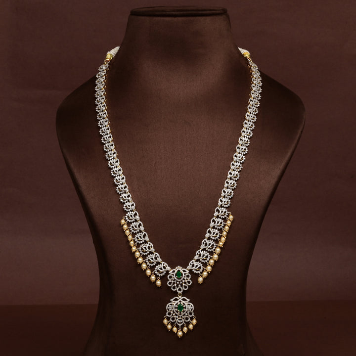 Hriday collection of 92.5 silver long necklace with CZ stones, intricate floral motifs, and pendant design for bridal and festive wear by Sri Fine Jewellery, Hyderabad.