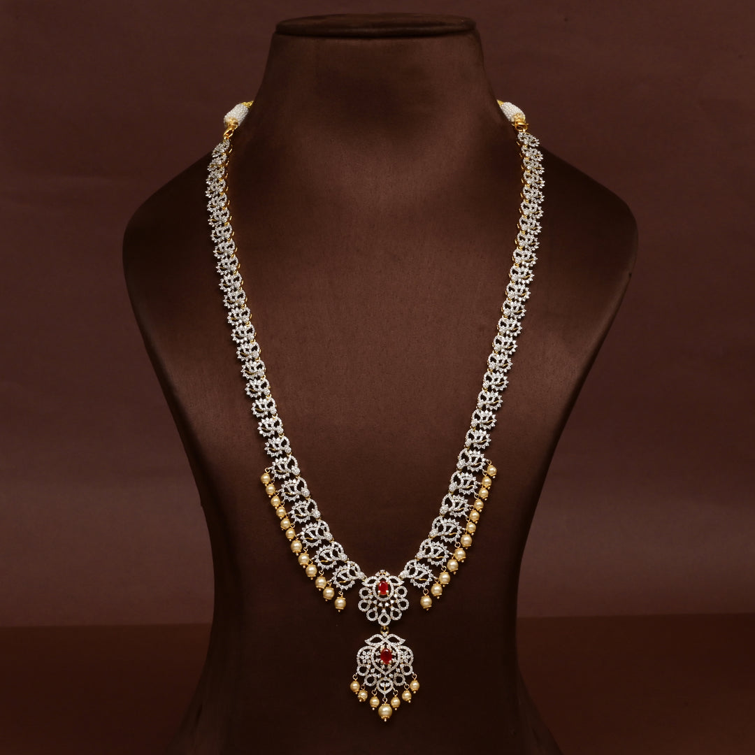 Hriday collection of 92.5 silver long necklace with CZ stones, intricate floral motifs, and pendant design for bridal and festive wear by Sri Fine Jewellery, Hyderabad.