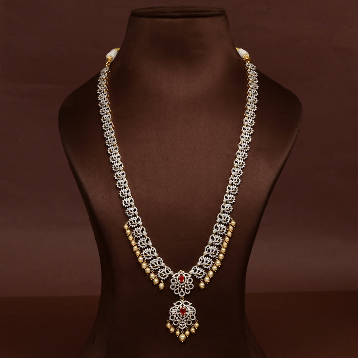 Hriday collection of 92.5 silver long necklace with CZ stones, intricate floral motifs, and pendant design for bridal and festive wear by Sri Fine Jewellery, Hyderabad.