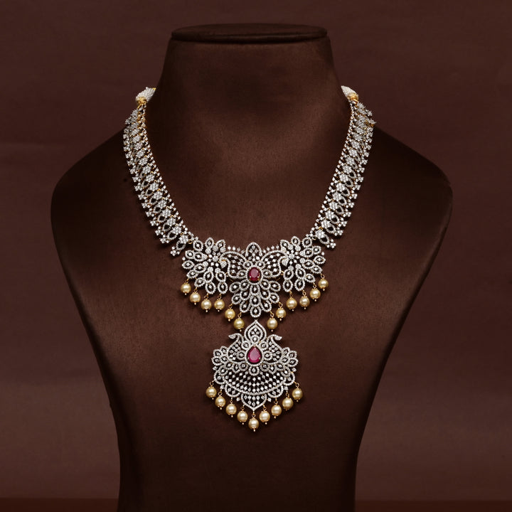 Hriday collection of 92.5 silver necklace with CZ stones, intricate floral motifs, and pendant design for bridal and festive wear by Sri Fine Jewellery, Hyderabad.