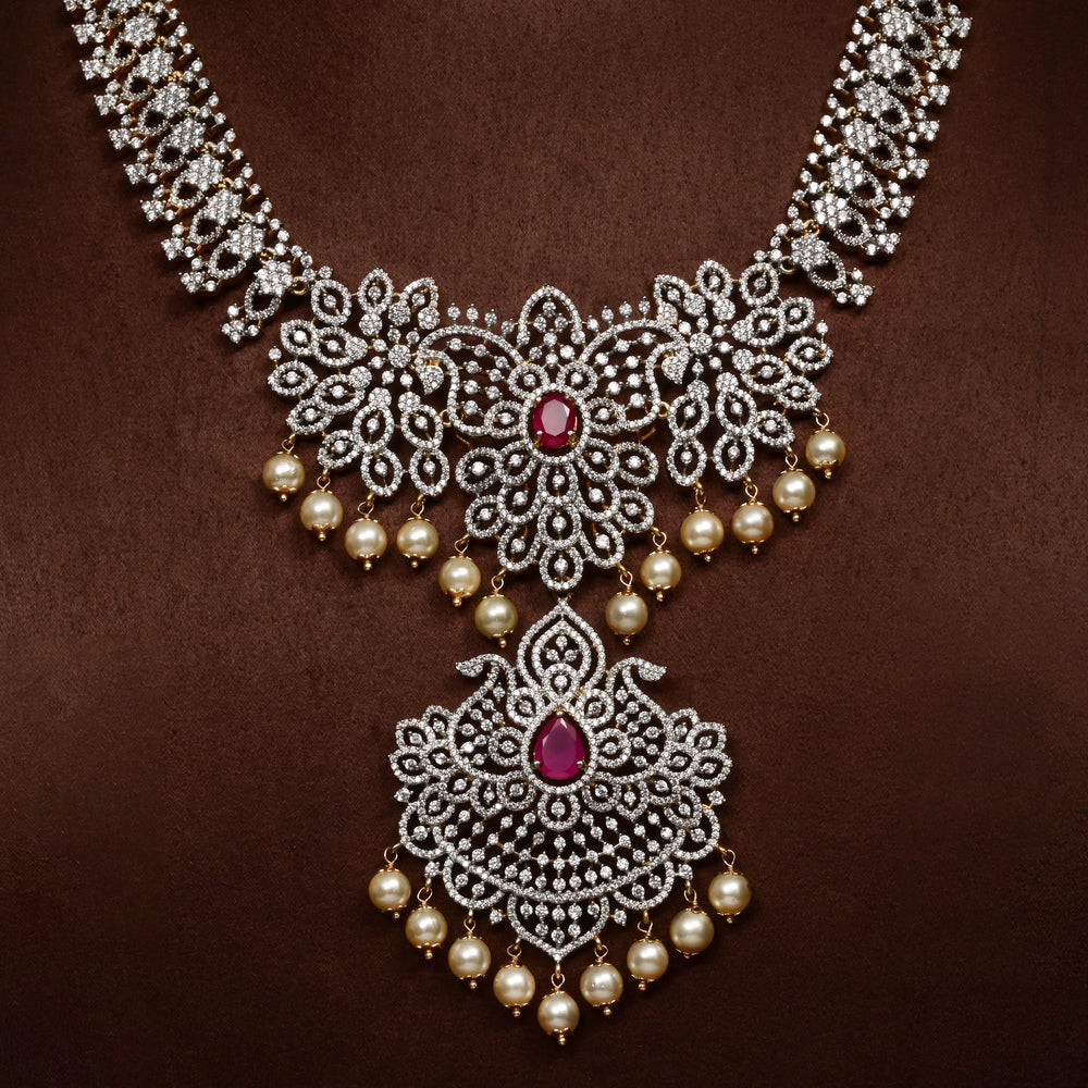 Close-up of Hriday collection of 92.5 silver necklace with CZ stones, intricate floral motifs, and pendant design for bridal and festive wear by Sri Fine Jewellery, Hyderabad.