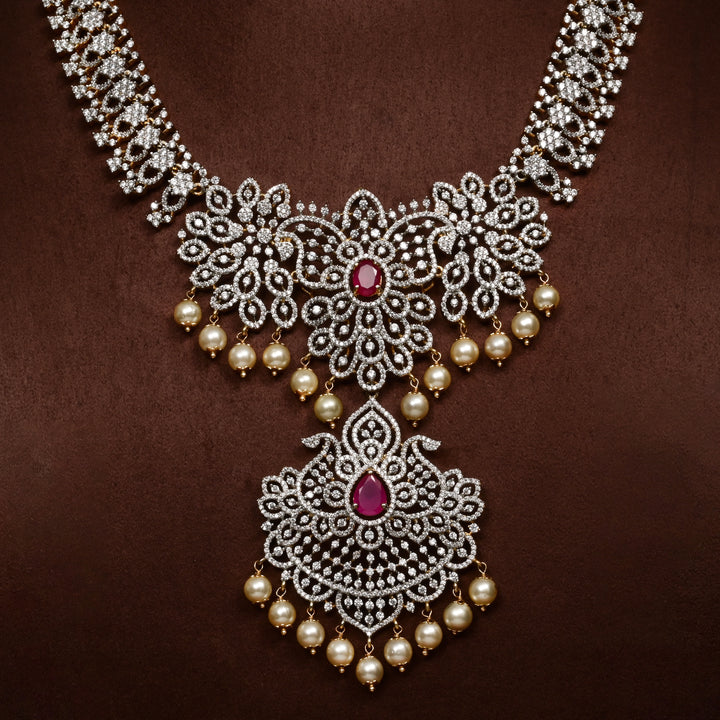 Close-up of Hriday collection of 92.5 silver necklace with CZ stones, intricate floral motifs, and pendant design for bridal and festive wear by Sri Fine Jewellery, Hyderabad.