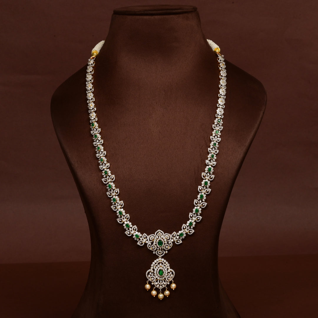 Hriday collection of 92.5 silver necklace with CZ stones, intricate floral motifs, and pendant design for bridal and festive wear by Sri Fine Jewellery, Hyderabad.