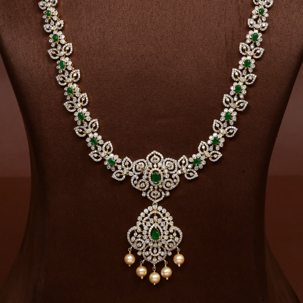 Close-up of Hriday collection of 92.5 silver necklace with CZ stones, intricate floral motifs, and pendant design for bridal and festive wear by Sri Fine Jewellery, Hyderabad.