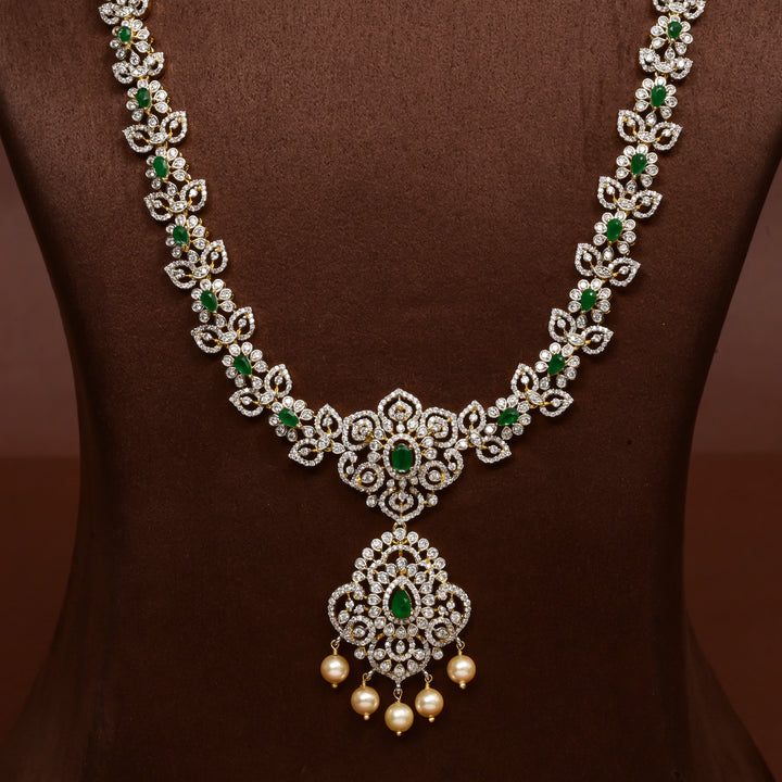 Close-up of Hriday collection of 92.5 silver necklace with CZ stones, intricate floral motifs, and pendant design for bridal and festive wear by Sri Fine Jewellery, Hyderabad.