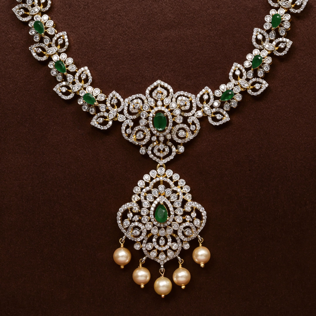 Close-up of Hriday collection of 92.5 silver necklace with CZ stones, intricate floral motifs, and pendant design for bridal and festive wear by Sri Fine Jewellery, Hyderabad.