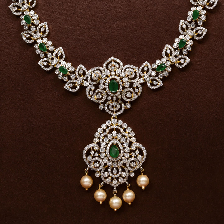 Close-up of Hriday collection of 92.5 silver necklace with CZ stones, intricate floral motifs, and pendant design for bridal and festive wear by Sri Fine Jewellery, Hyderabad.