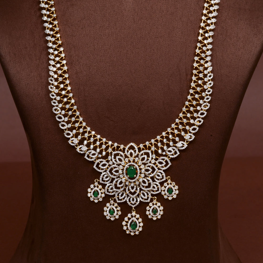 Close-up of Hriday collection of 92.5 silver necklace with CZ stones, intricate floral motifs, and pendant design for bridal and festive wear by Sri Fine Jewellery, Hyderabad.