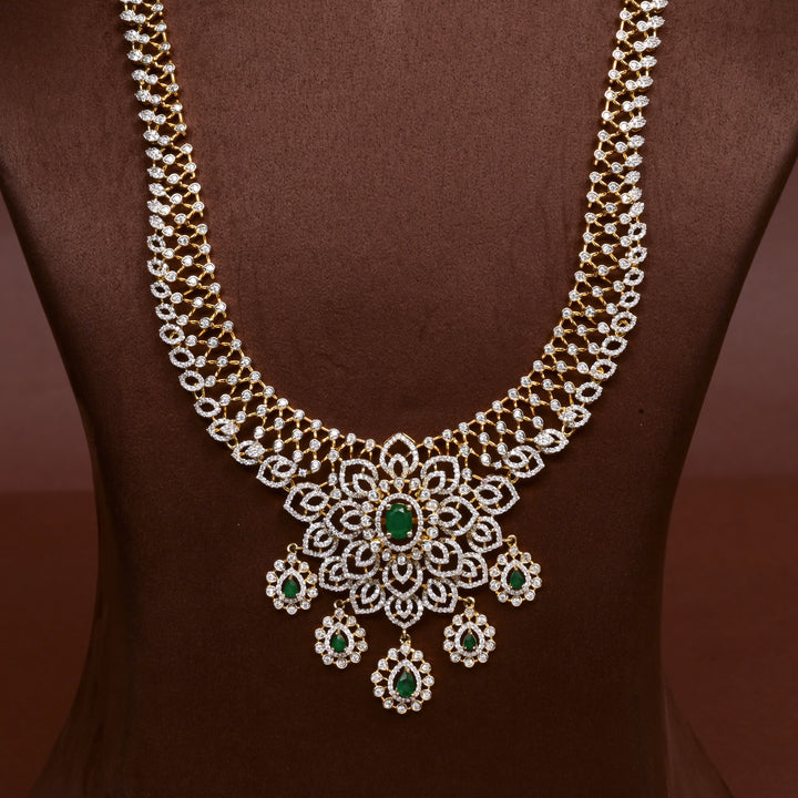 Close-up of Hriday collection of 92.5 silver necklace with CZ stones, intricate floral motifs, and pendant design for bridal and festive wear by Sri Fine Jewellery, Hyderabad.