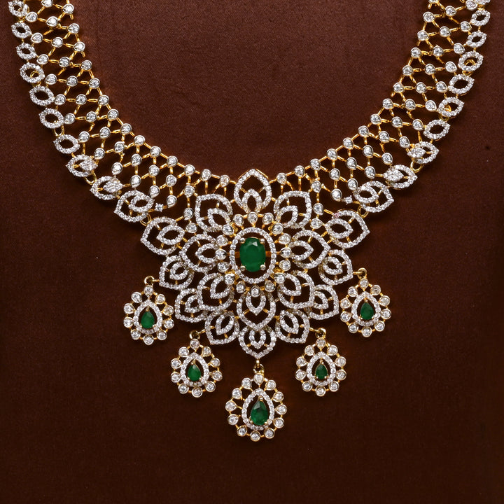 Close-up of Hriday collection of 92.5 silver necklace with CZ stones, intricate floral motifs, and pendant design for bridal and festive wear by Sri Fine Jewellery, Hyderabad.