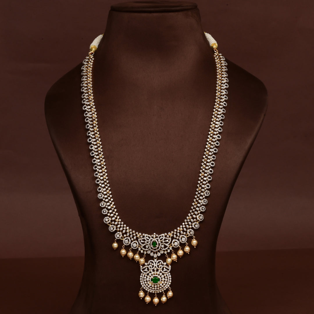 Hriday collection of 92.5 silver necklace with CZ stones, intricate floral motifs, and pendant design for bridal and festive wear by Sri Fine Jewellery, Hyderabad.